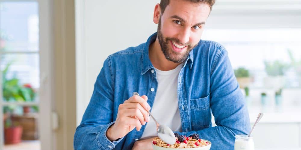 Man eating breakfast.