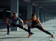 Couple stretching before work out.