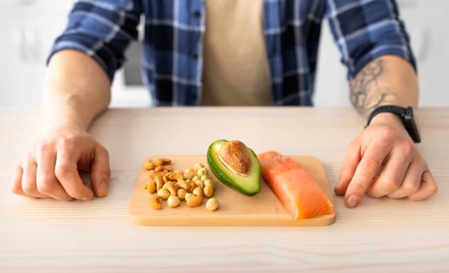 Opting for monounsaturated fats vs. saturated fats can help decrease LDL cholesterol and increase HDL cholesterol.
